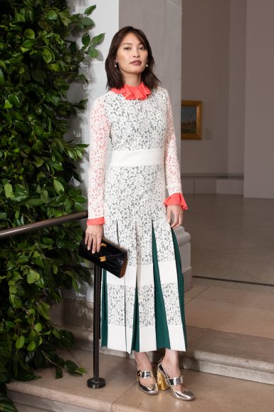 Aya Omasa wearing Fall Winter 2019 Pleated Lace Dress, Buddy Clover Pearl Drop Earrings, Lee Radziwill Shoulder Bag and Madison Mary-Jane Pumps